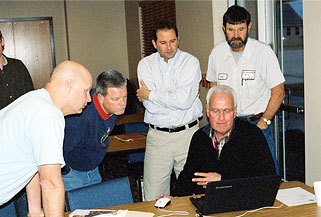 Photo of state and local emergency personnel meeting